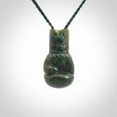 Hand carved boxing glove made from Jade. The cord is adjustable so that you can wear this where it suits you best. The cost of shipping worldwide is included in the price.